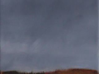 Not even the sound of birdsong can be heard under this blue-gray sky with a wisp of white cloud over a Cape Ann marsh of green and brownish-red sea grasses.